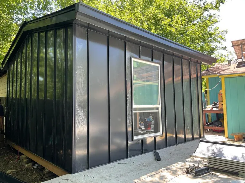 Black standing seam metal wall panels for Roof Inspection in Bothell West